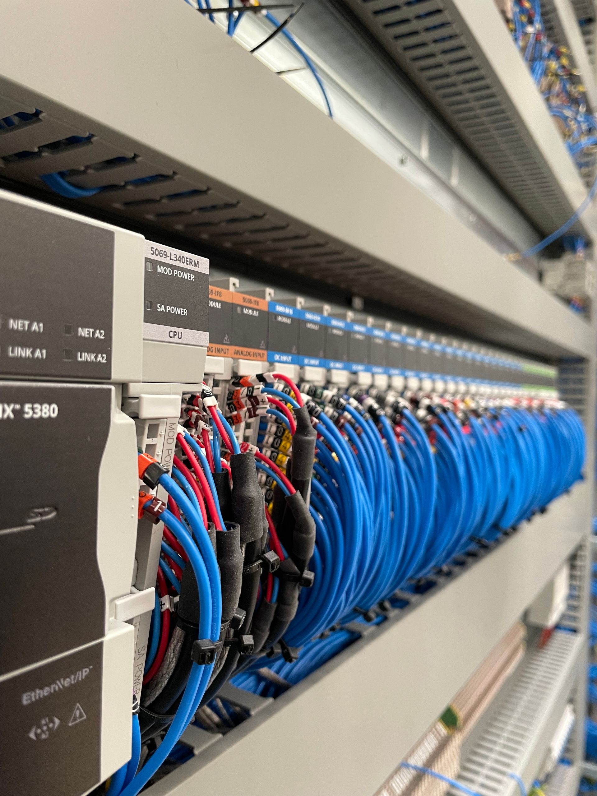 Close up of  Allen Bradley PLC wiring within a Rittal control enclosure