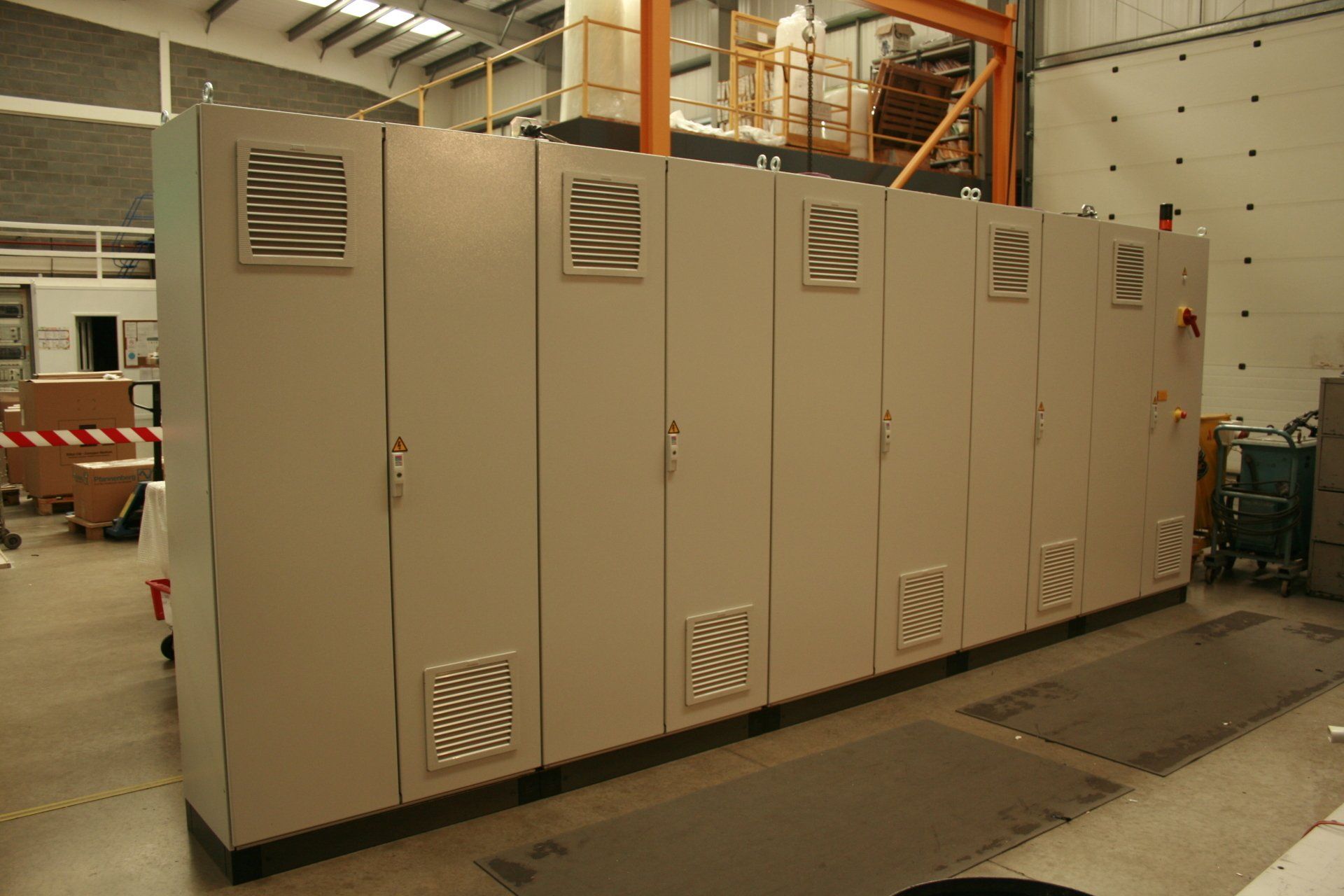Multi bay panel with white panels installed at site