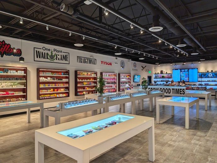 A OnePlant Store filled with lots of shelves and tables.