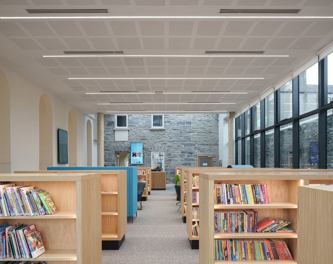 There are a lot of books on the shelves in the library.