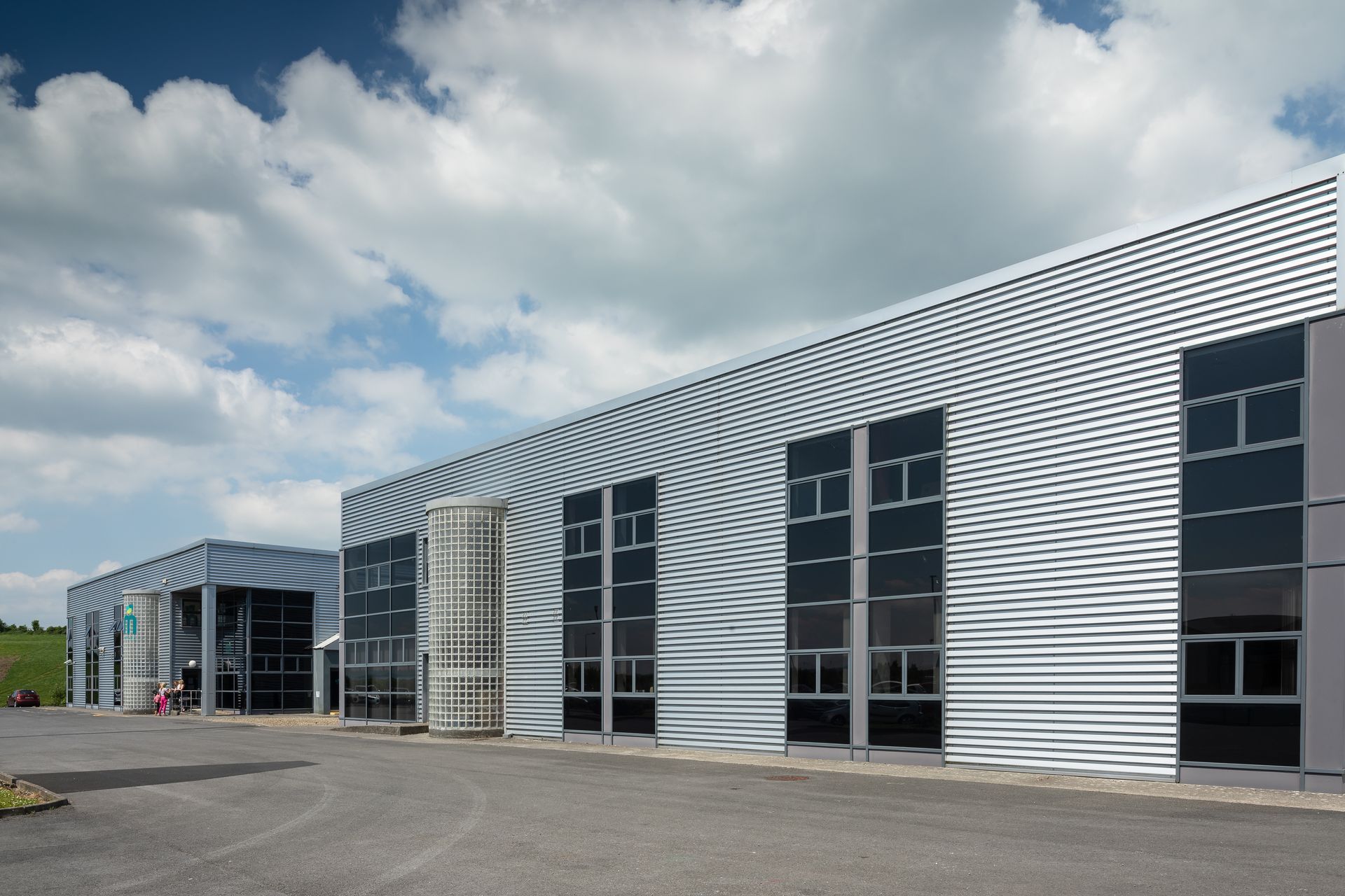 A large building with a lot of windows and a staircase