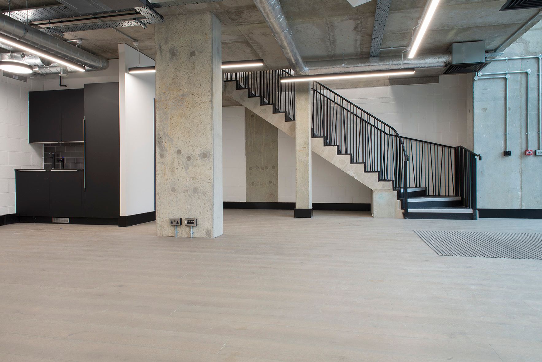 There is a staircase in the middle of the room.