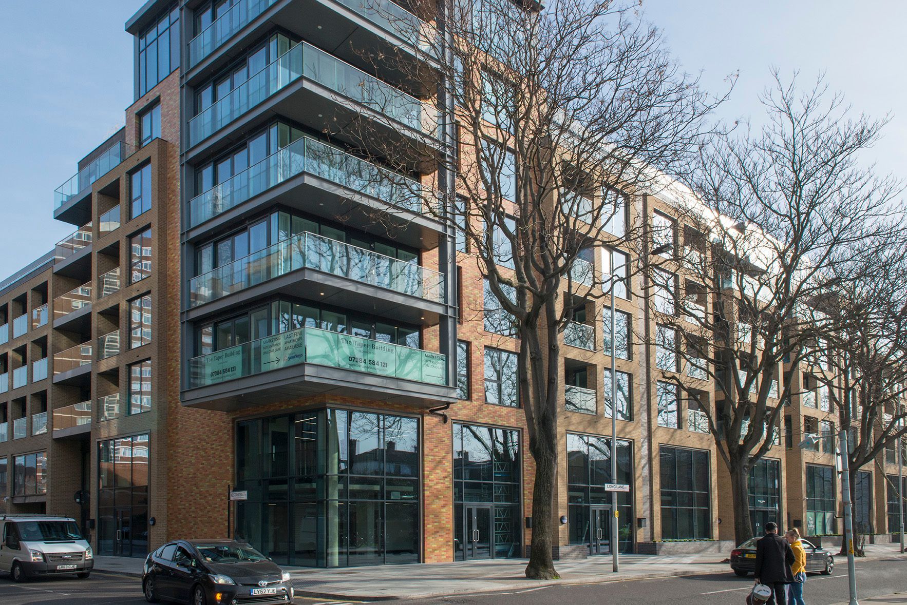 A large building with a lot of windows and balconies