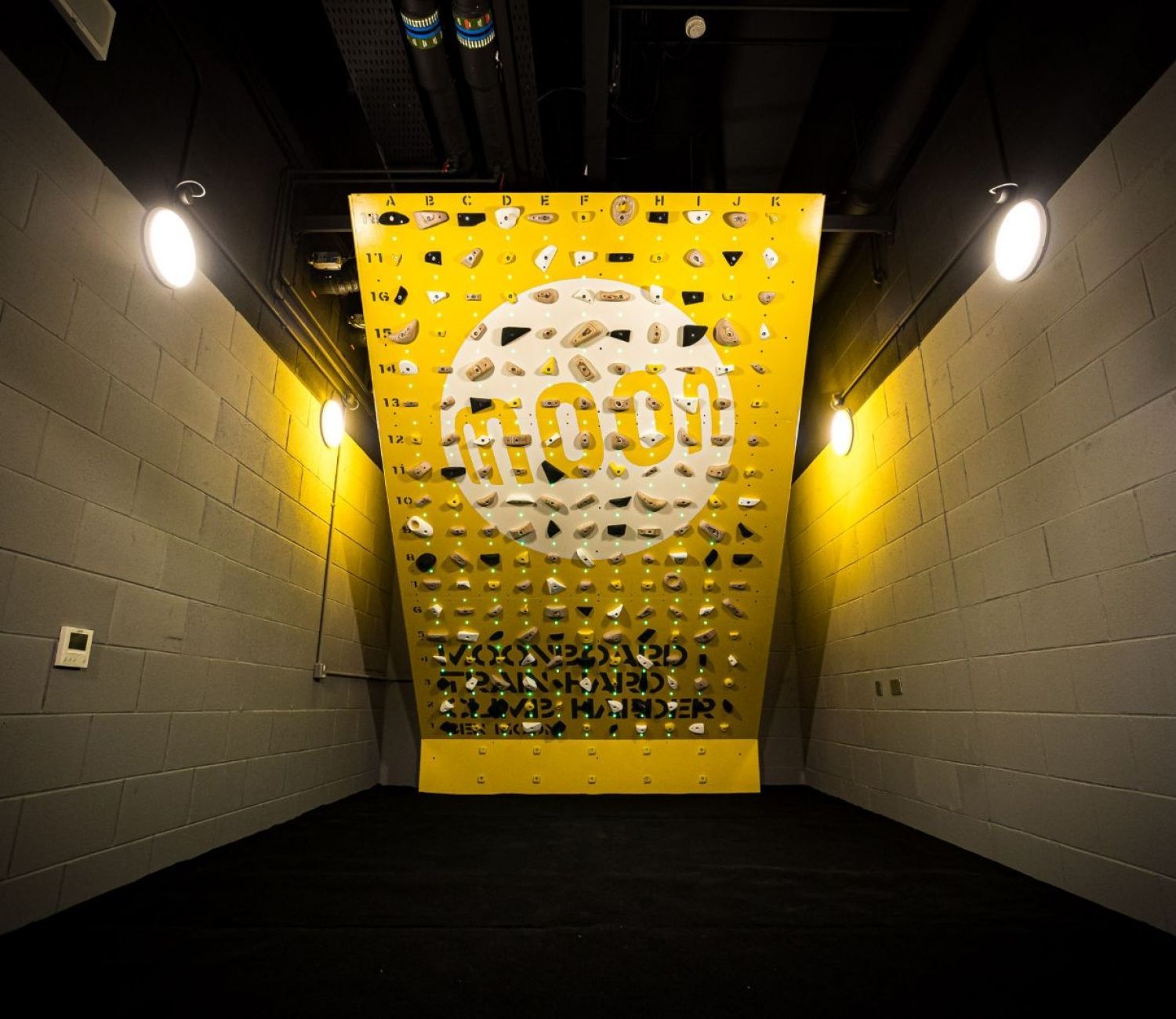 A room with a yellow wall that has the word food on it