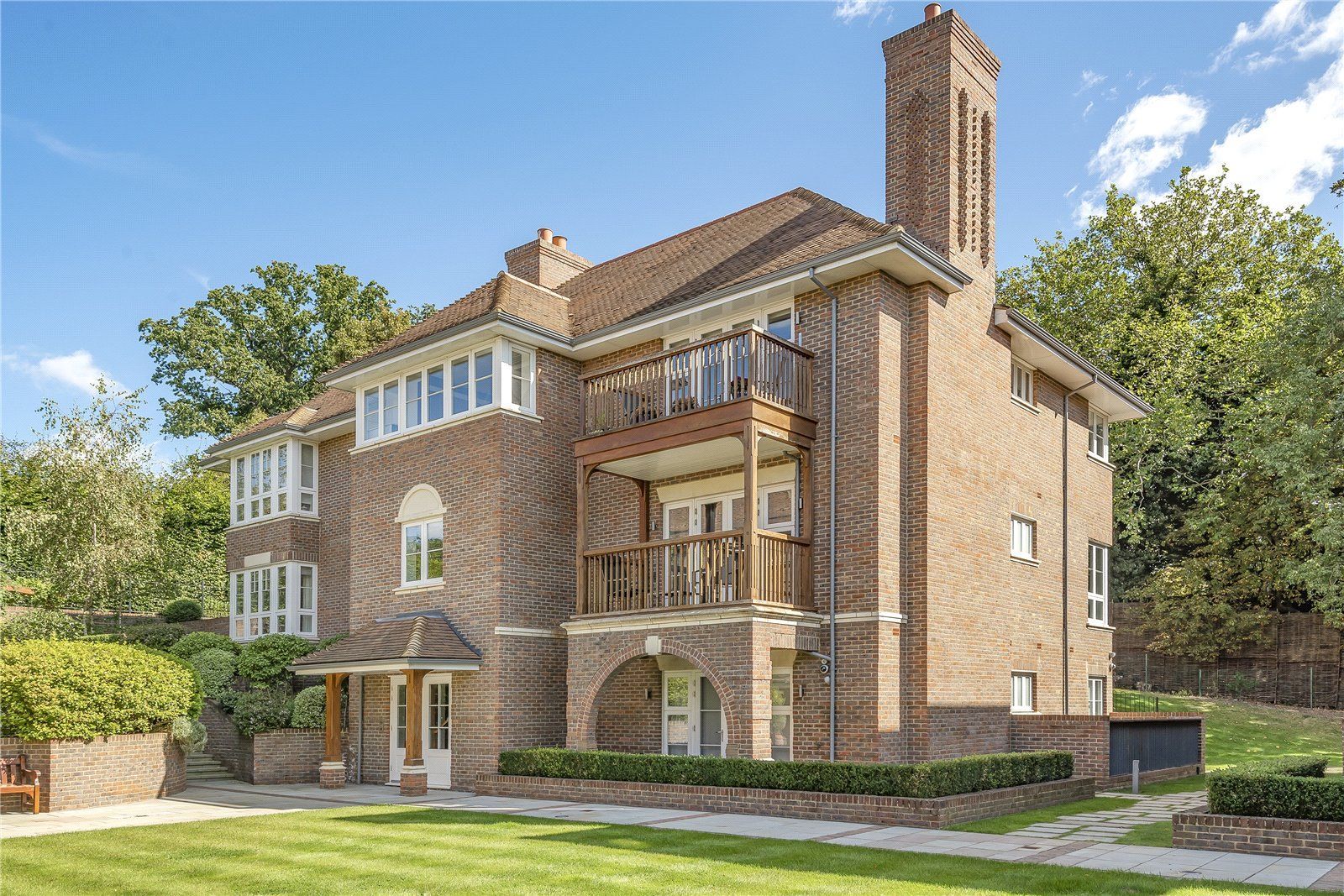 A large brick building with a chimney on top of it