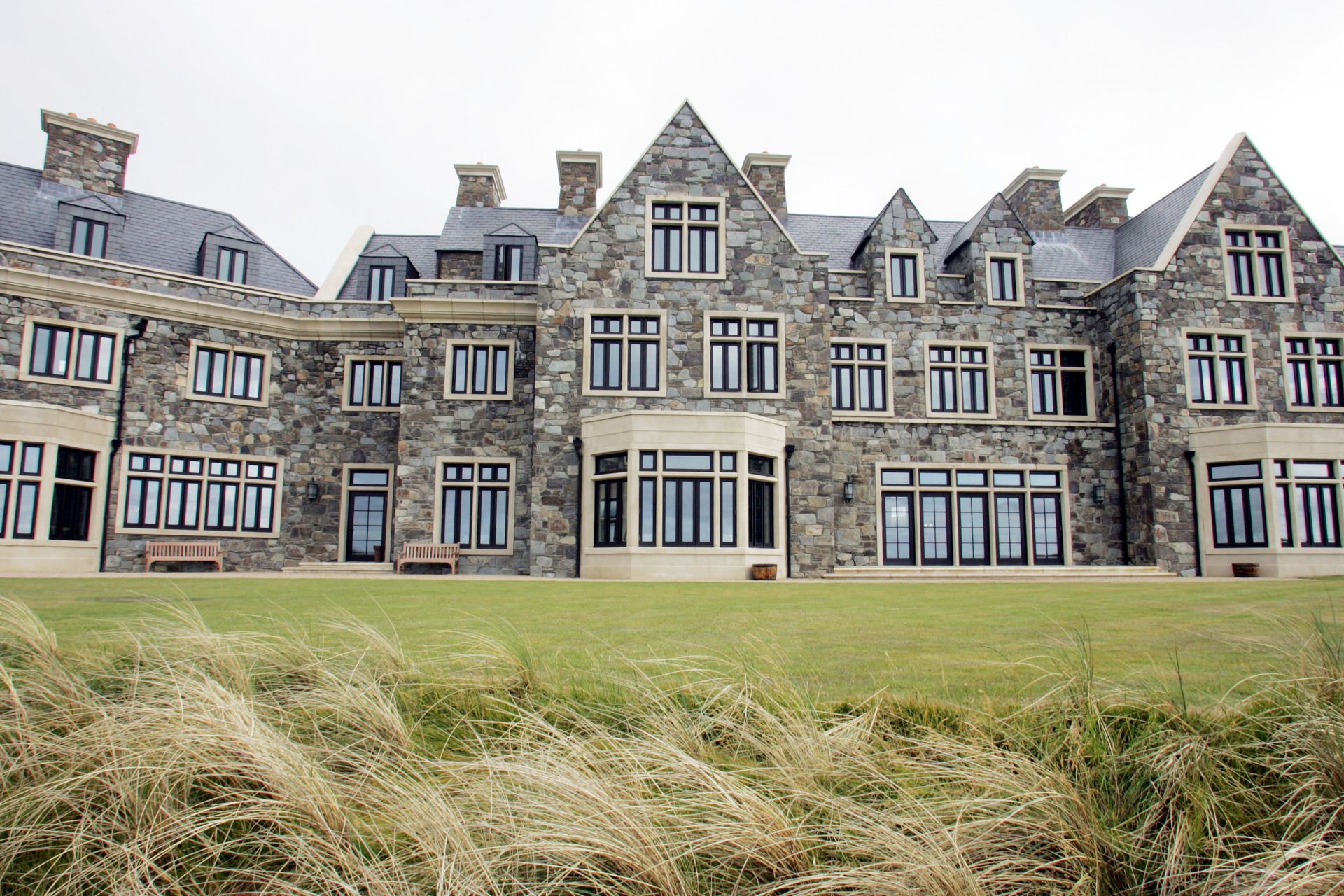 A large stone building with a lot of windows
