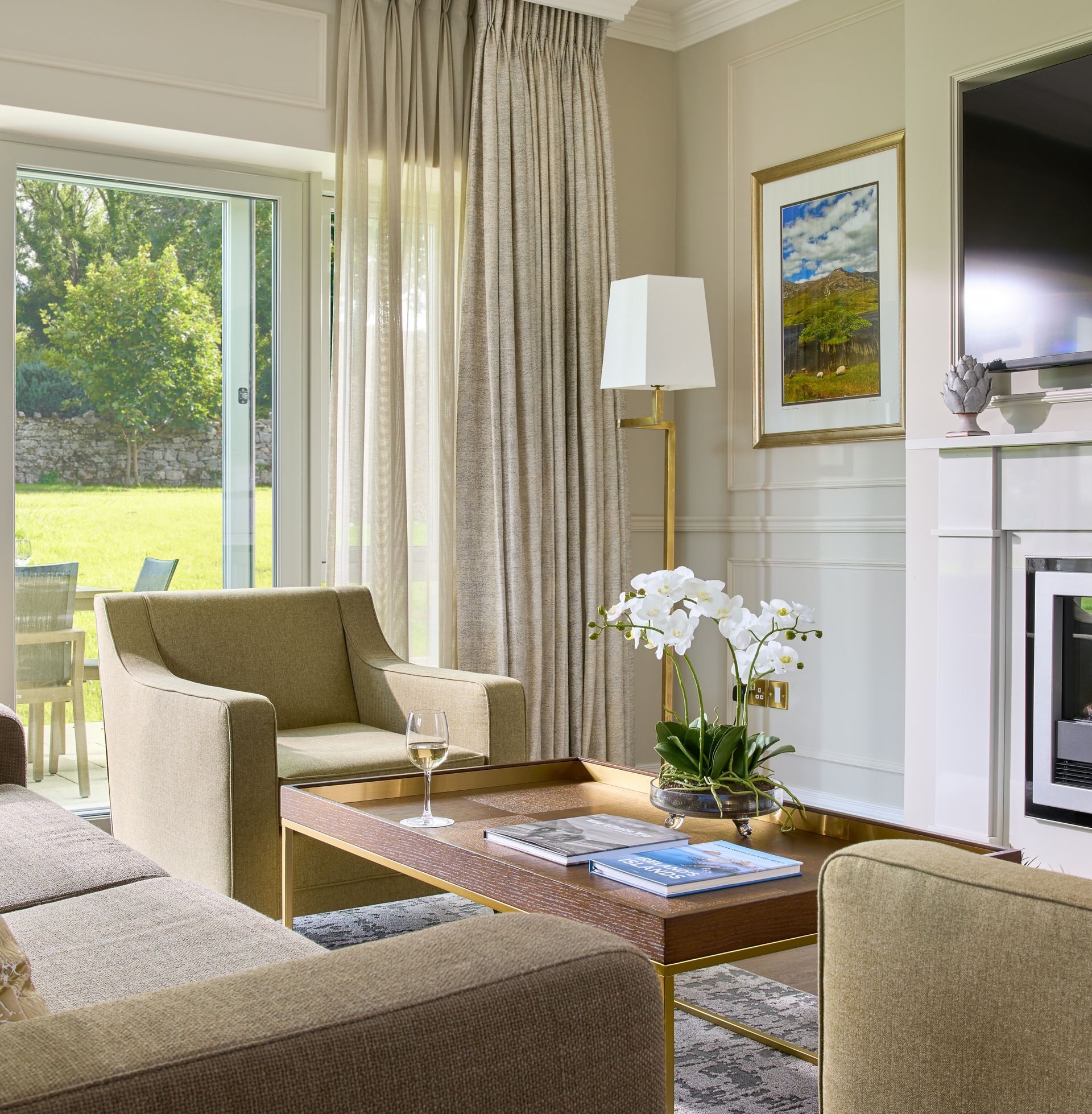 A living room with a couch a chair and a coffee table
