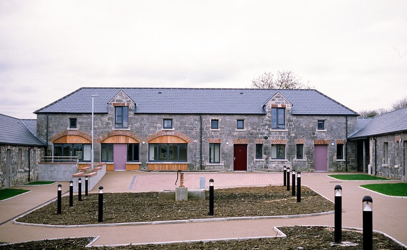 A large stone building with a slate roof