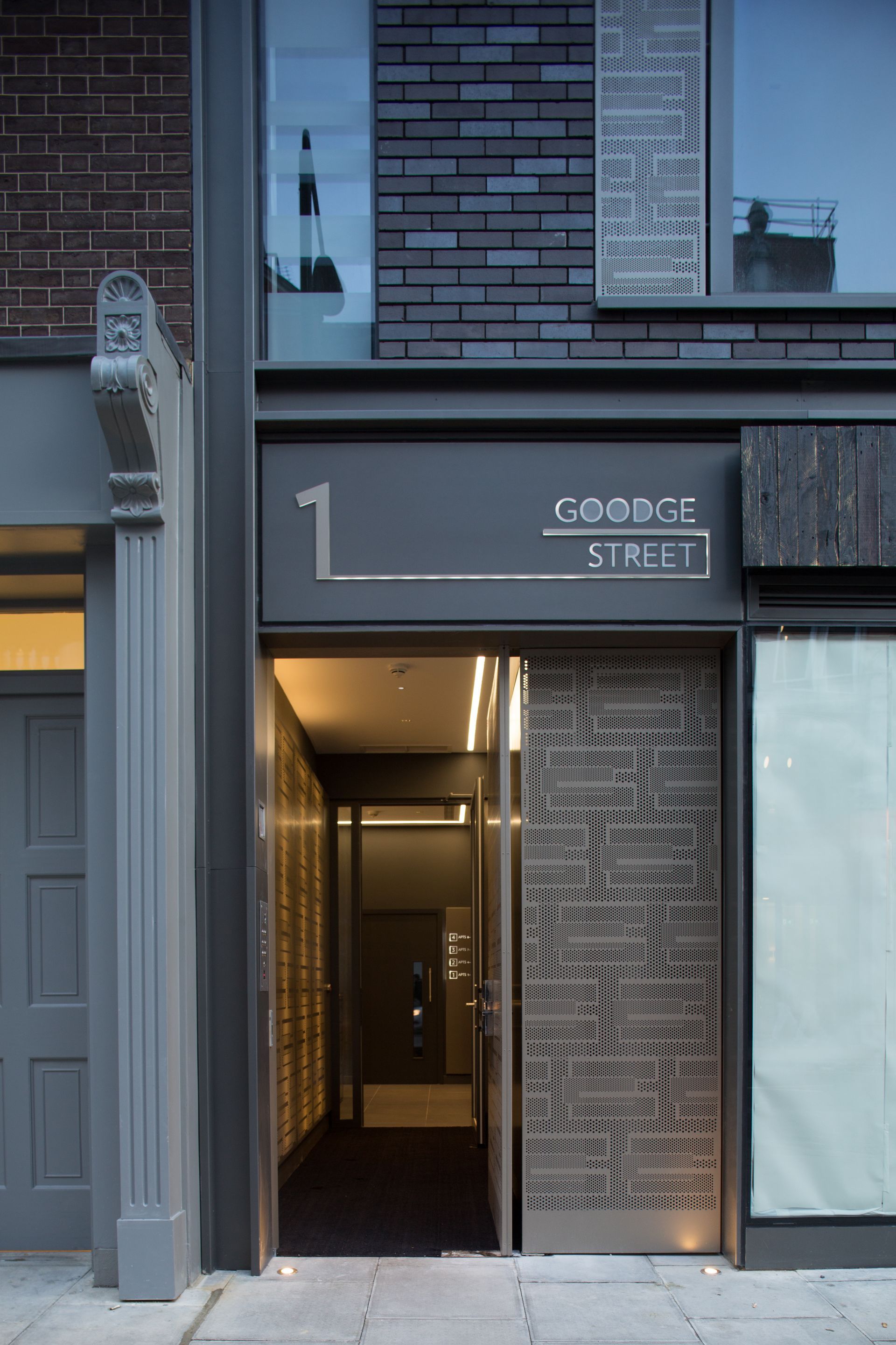 A building with a sign that says coope street on it