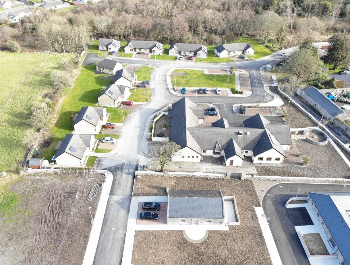 An aerial view of a residential area with lots of houses