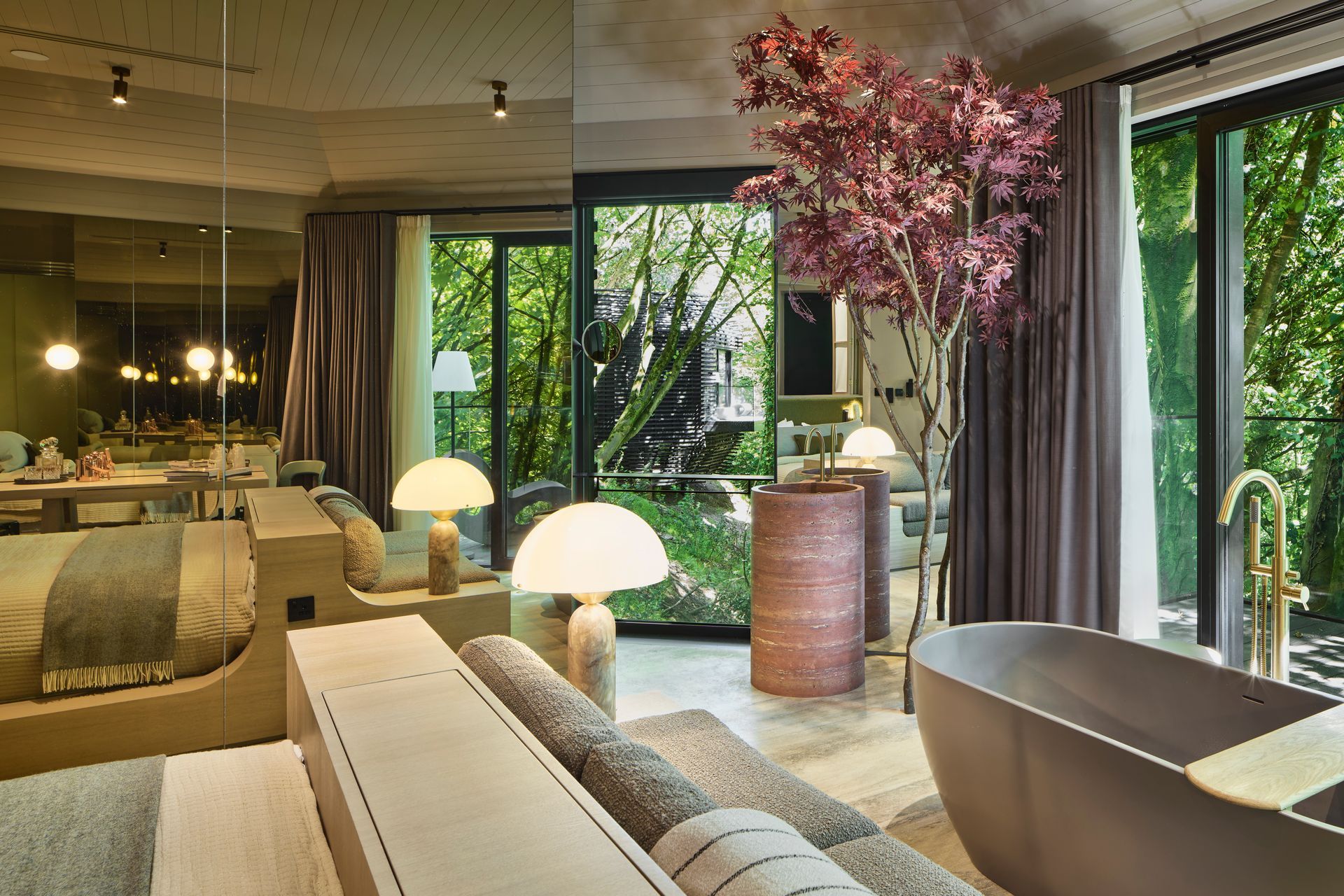 A large body of water with buildings in the background and a green buoy in the middle.