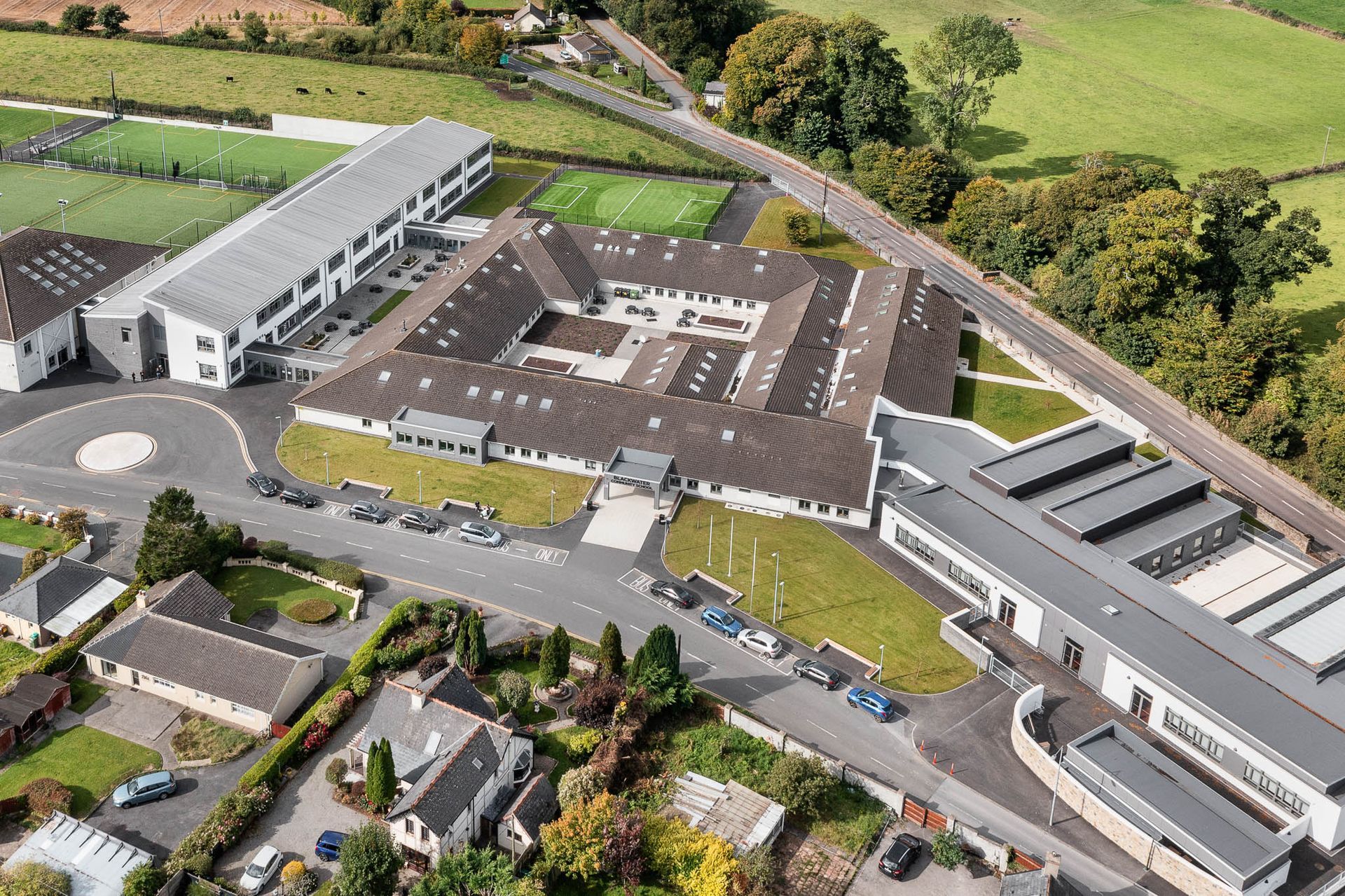 An aerial view of a school with a lot of buildings