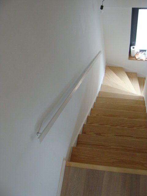 Escalier en bois et métal, quart tournant