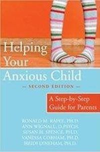 Book cover titled Helping Your Anxious Child with an image of someone wearing striped socks standing on a wooden floor.