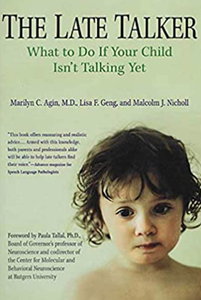 Book cover: The Late Talker, a child looking at the viewer. Title in green, author names below.