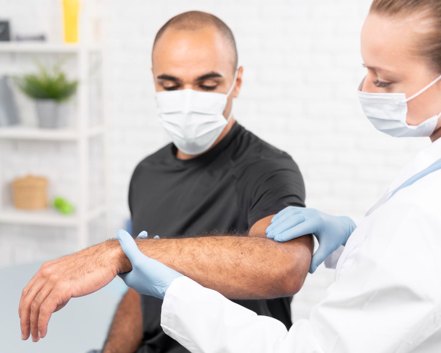 doctor holding patient's arm  - skin patch testing