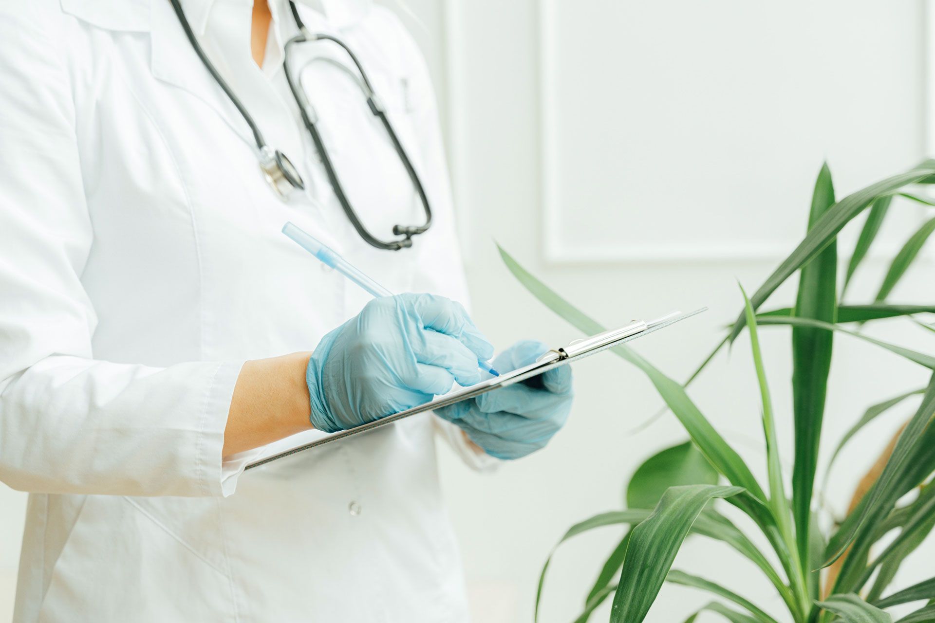 doctor with clipboard close up