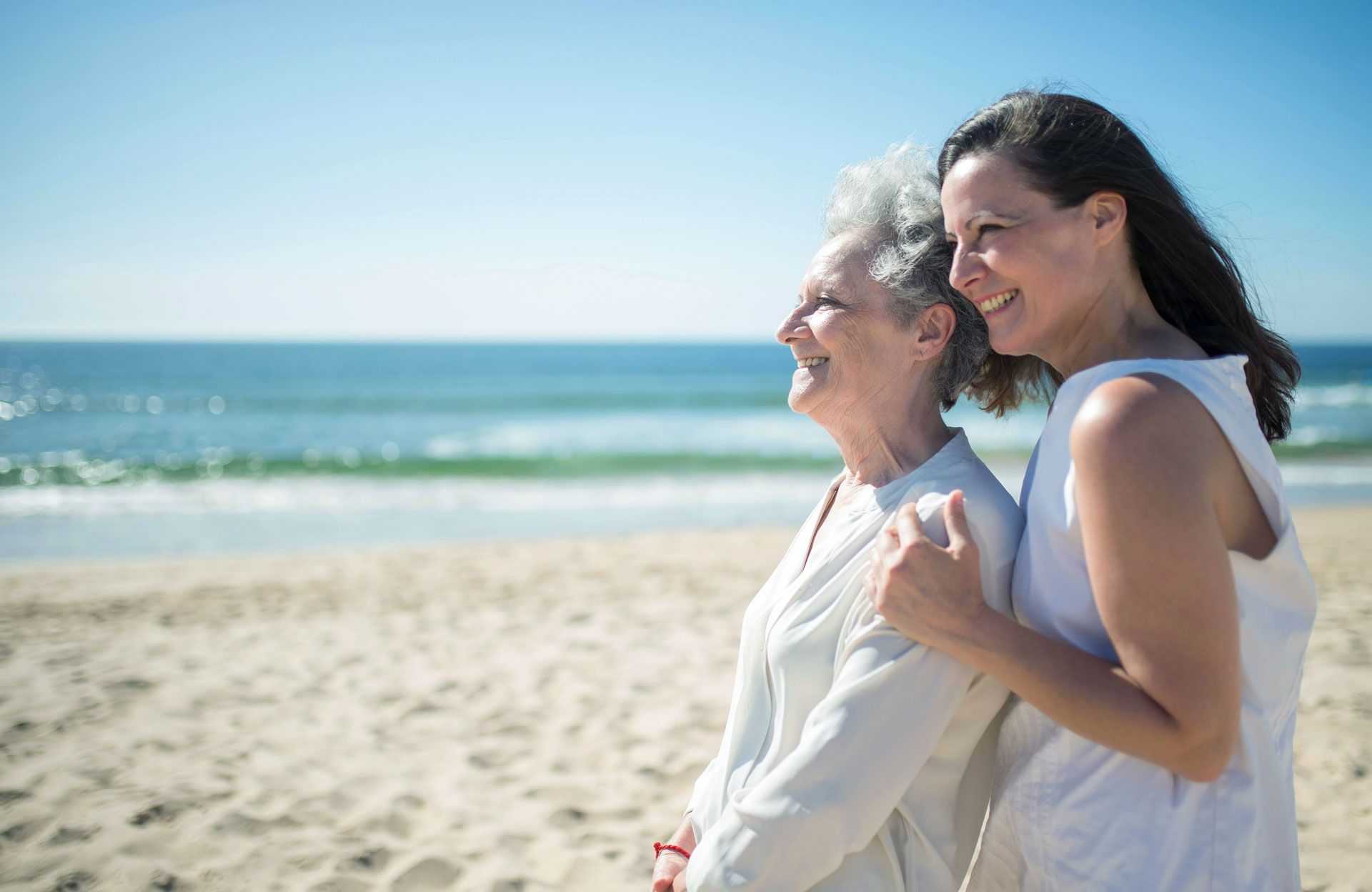daughter and mom on beach together