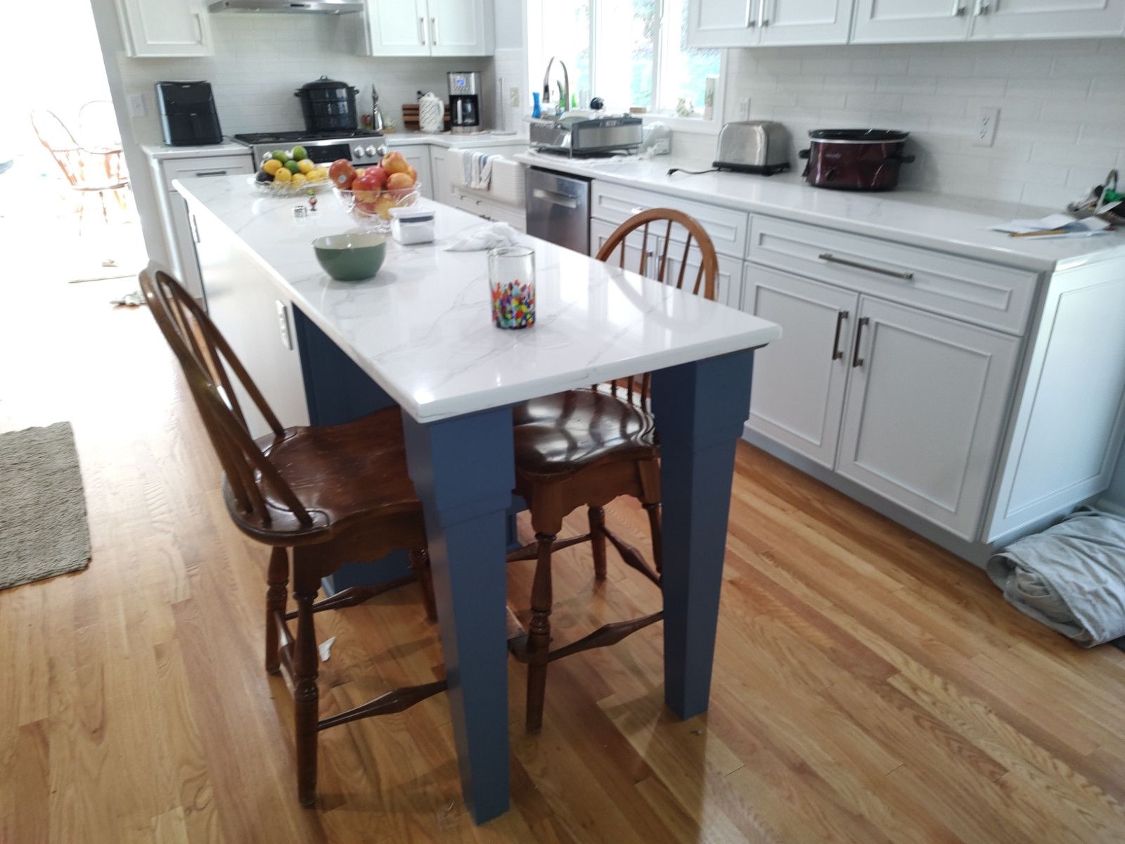 kitchen featuring wood flooring, Floors by Recon