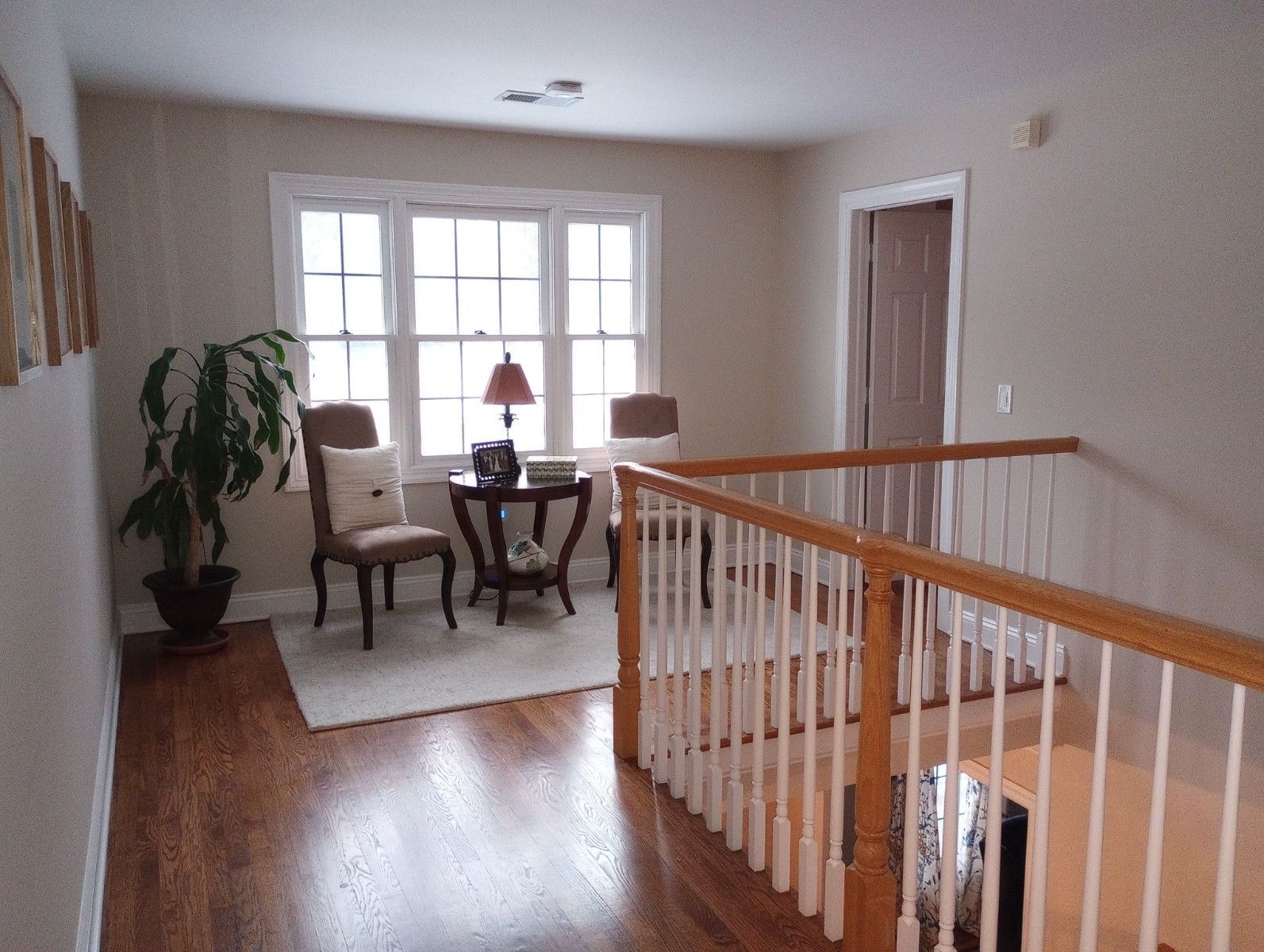 Hallway showing wood flooring, Floors by Recon