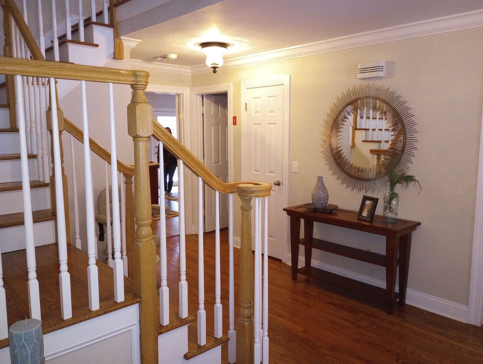 Entryway with stairs showing hardwood floor, Floors by Recon