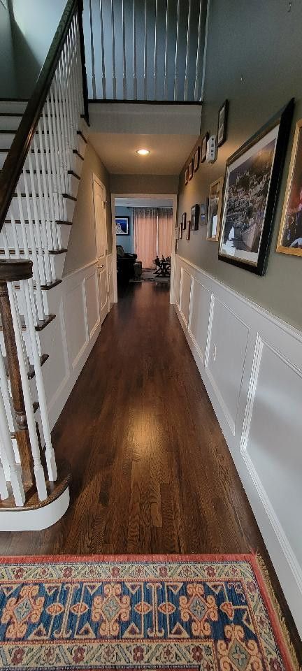 Hallway showing a wood floor, Floors by Recon