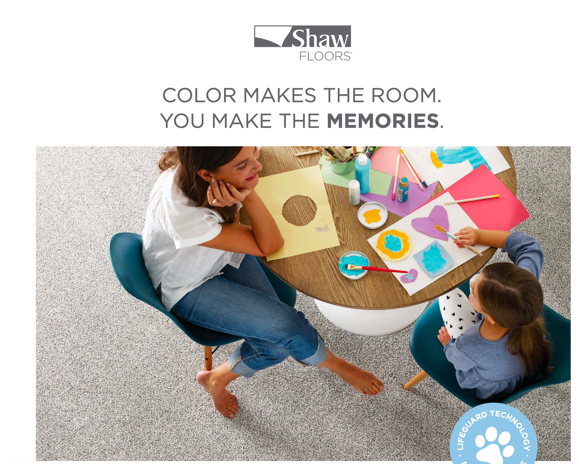 Family sitting at table from above, Floors by Recon