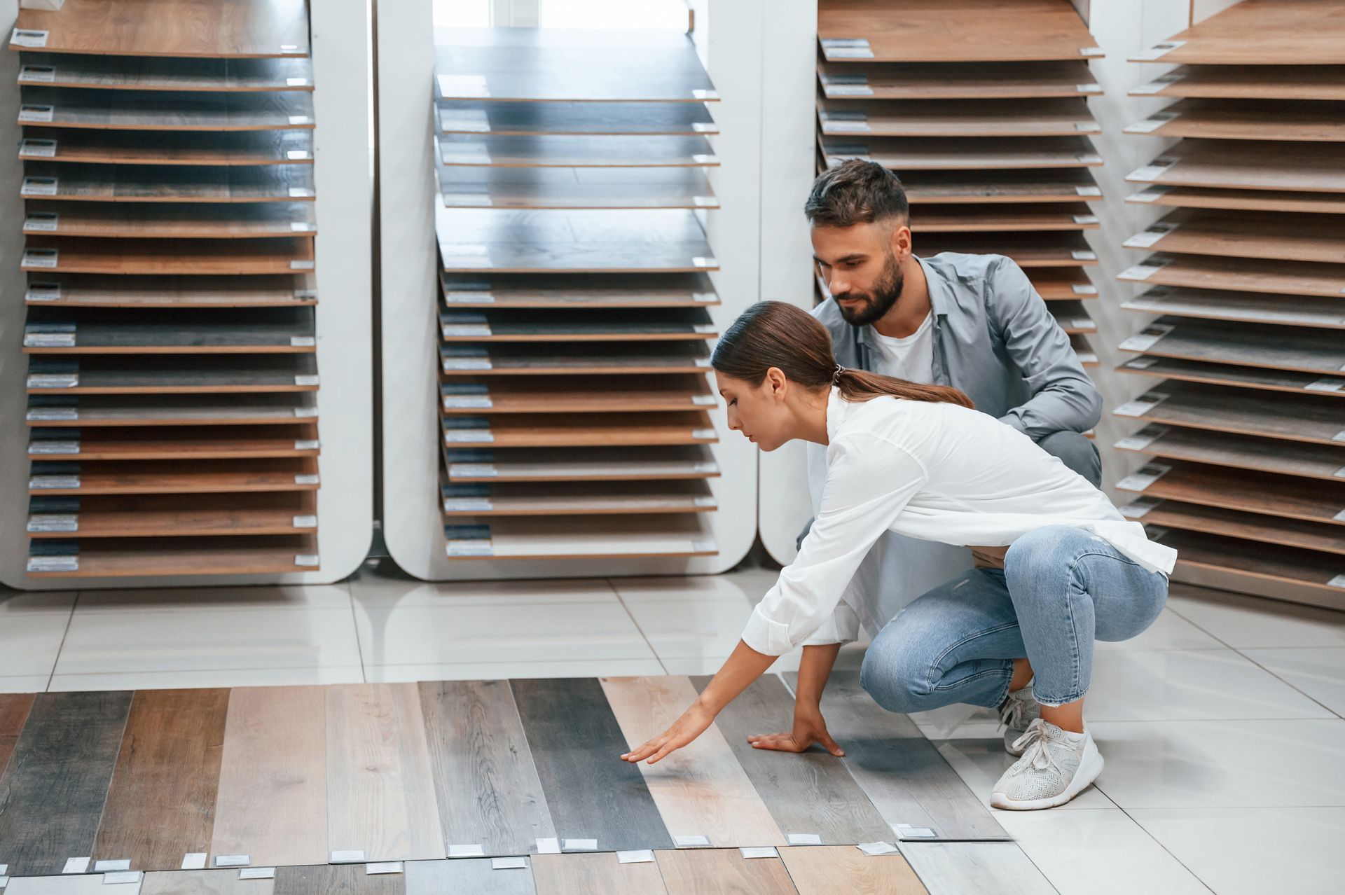 Couple choosing floor covering, Floors by Recon
