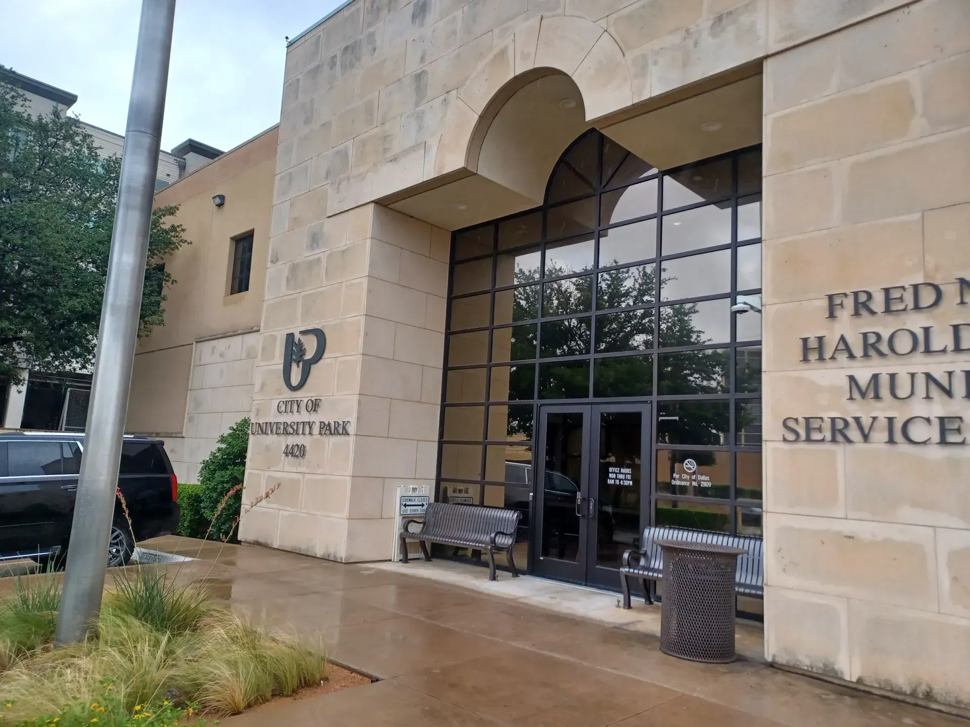 A building with a sign that says fred harold muni service