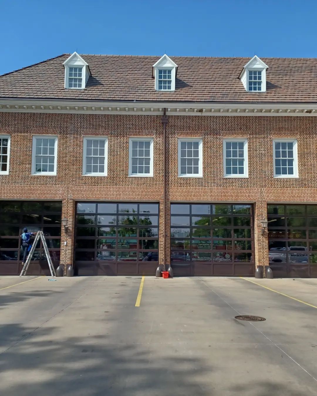 A large brick building with a lot of windows