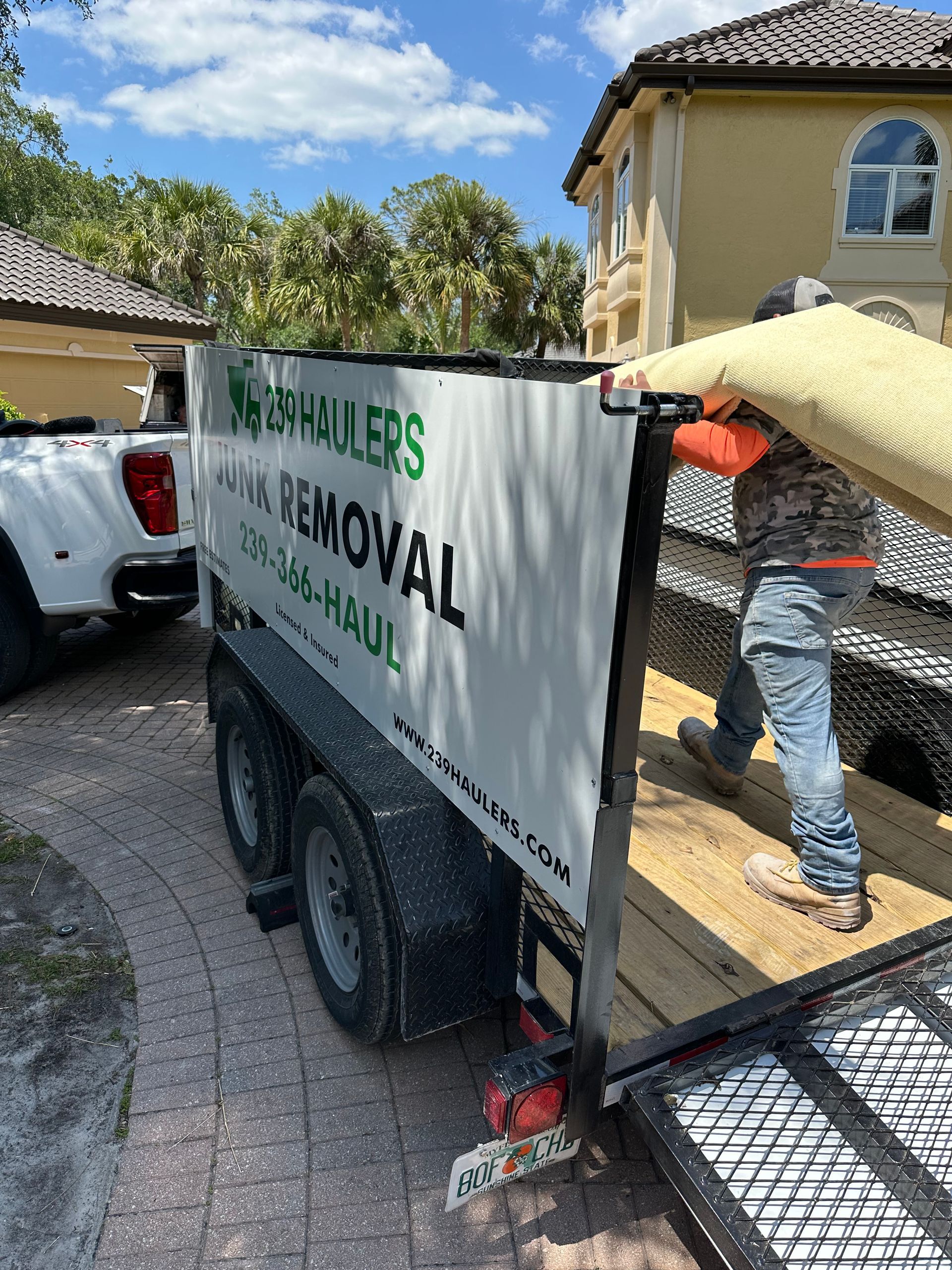 239 Haulers, Removing old carpet in Collier and Lee County.