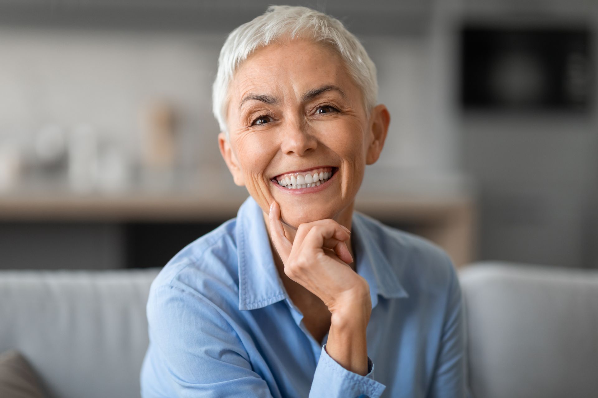 Mature happy woman with thick natural eyebrows