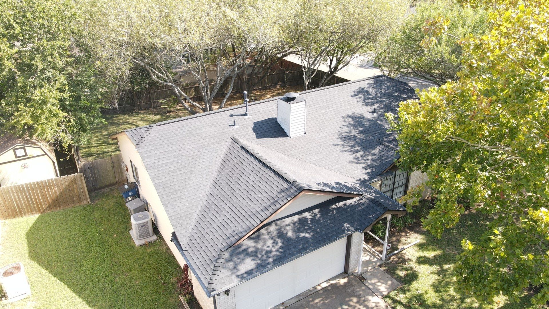 Arial view of a residential home with a new roof