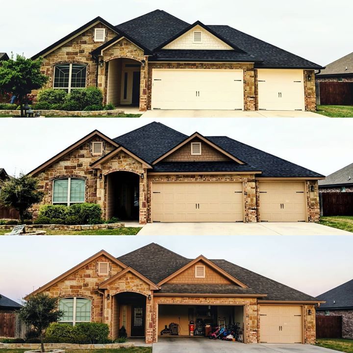 Three homes with stone facades, tan garage doors, and dark roofs under an overcast sky.