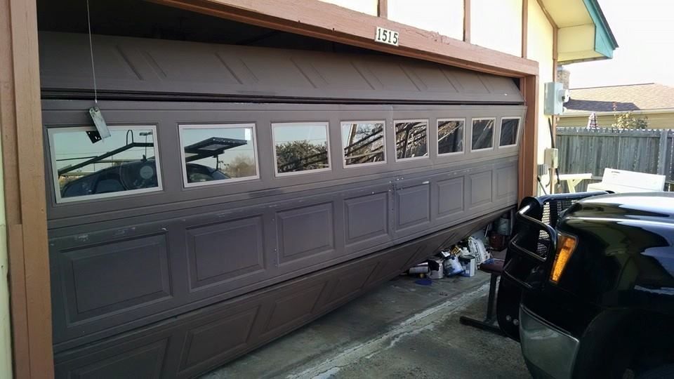 A garage door with a picture of a car on it