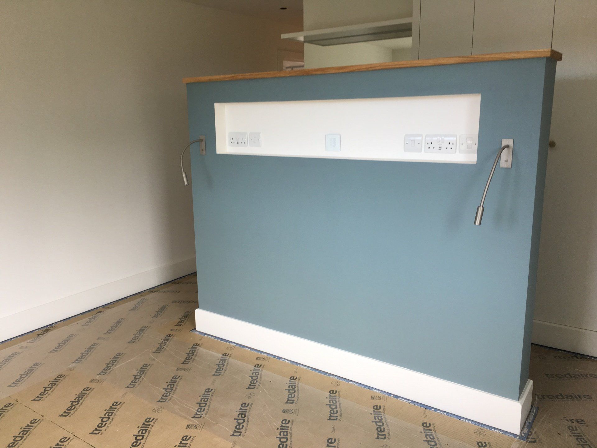 Bedroom feature wall behind Bed