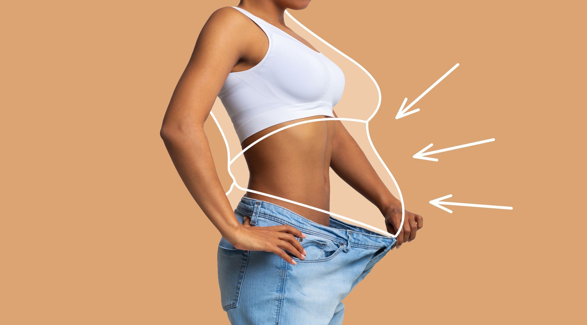 A woman is wearing a white tank top and blue jeans.