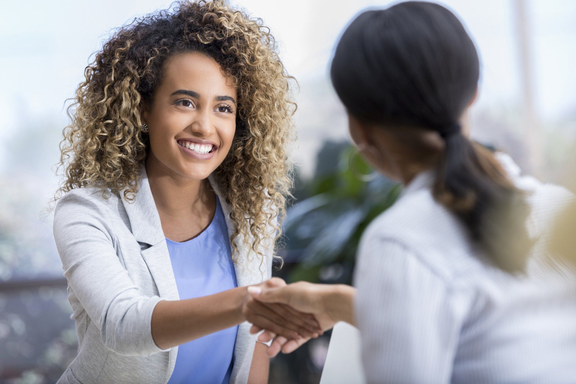 Shaking Client's Hand — Plano, TX — J Williams Group