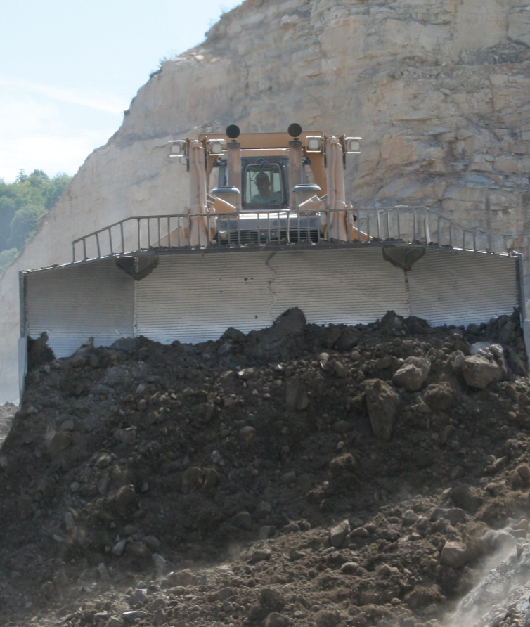 Aggregate industry - dozer blade liner