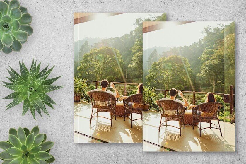 A printed book with a picture of a man and a woman on the beach