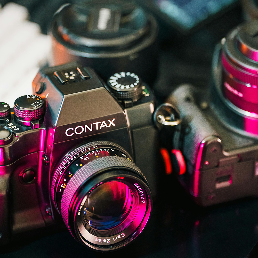 A camera and some other items on a table