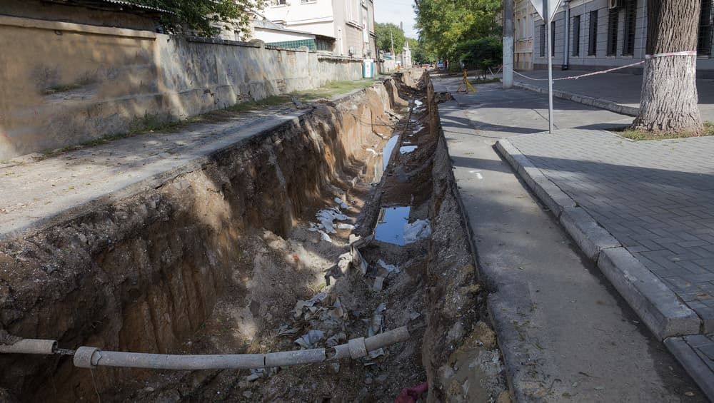 Large Hole Due To Drainage Repair — Russell Plumbing In Manunda, QLD