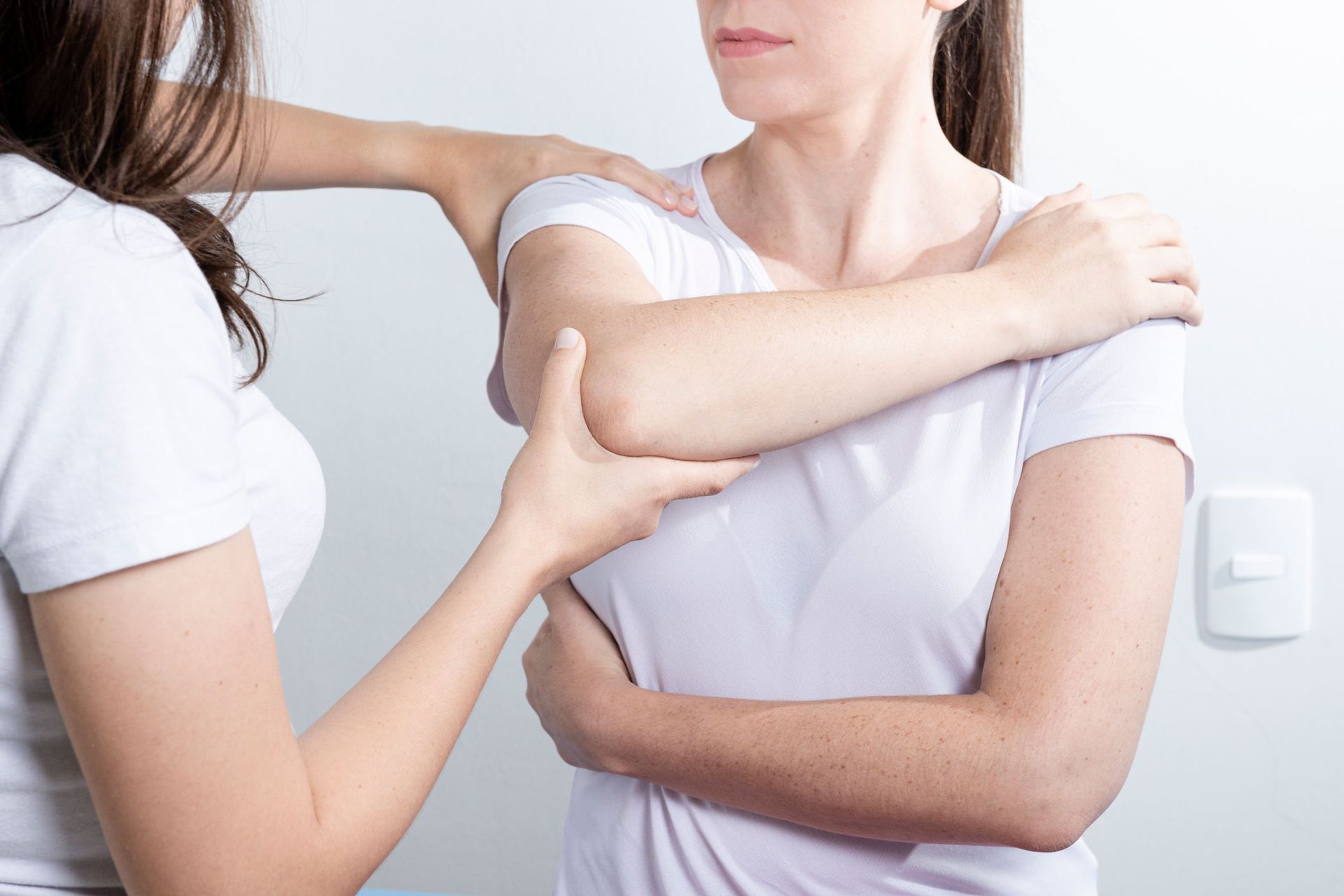 Physiotherapist giving treatment massage to the arm | Echuca, VIC | Echuca Chiropractic Clinic