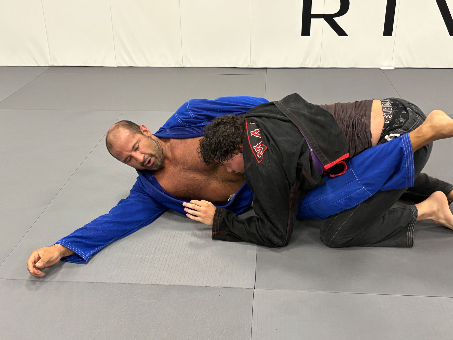 Students practicing Brazilian Jiu-Jitsu techniques at Rival Jiu-Jitsu academy in Waldwick NJ.