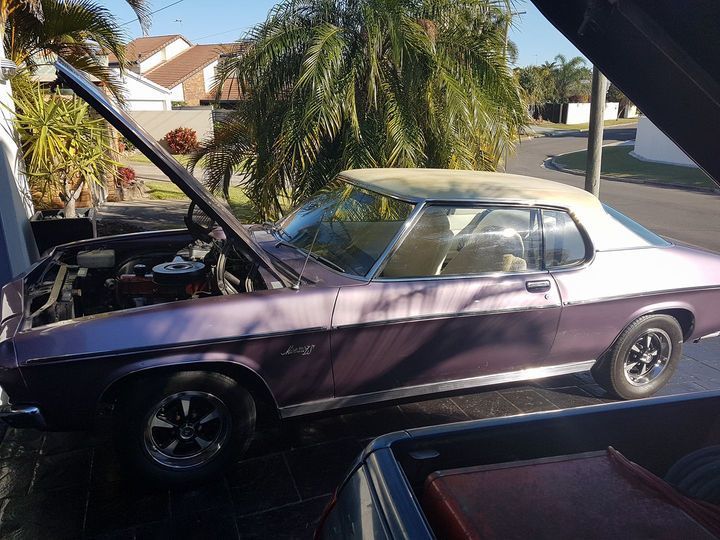 A Purple Car with The Hood Open Is Parked on The Side of The Road — Automotion Mechanical In Pacific Paradise, QLD