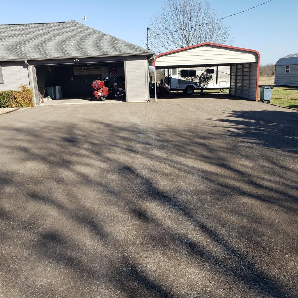 A house with a carport in front of it