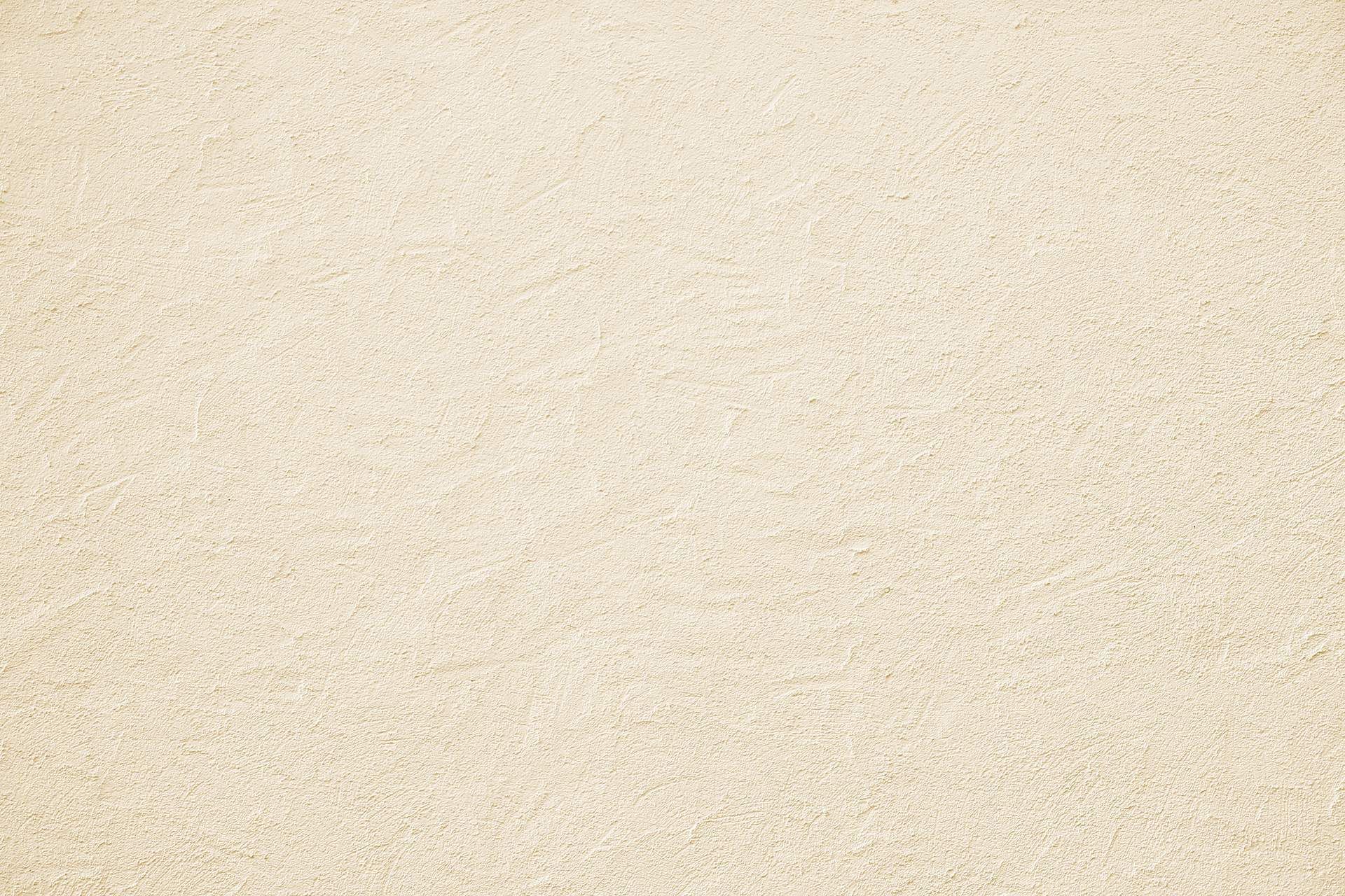 A close up of a sandy beach with a grainy texture.