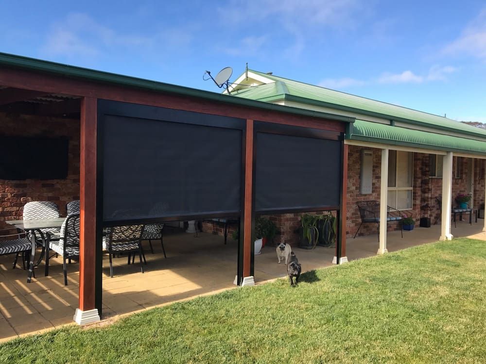 A House with A Patio and A Satellite Dish on The Roof — Douglass Blinds & Security Screens in Southern Highlands, NSW