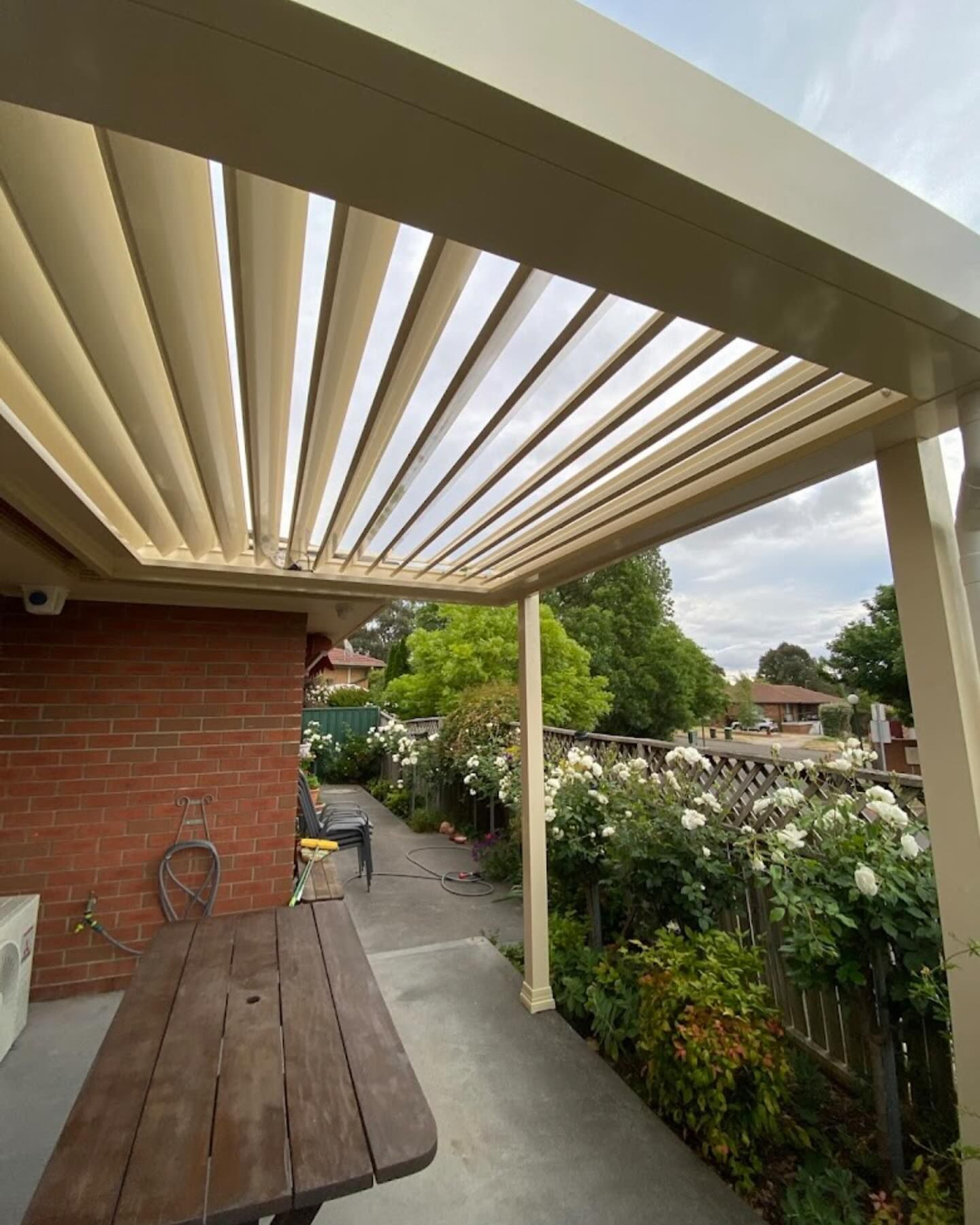 A Patio with a Open Roof System — Douglass Blinds & Security Screens in Goulburn, NSW