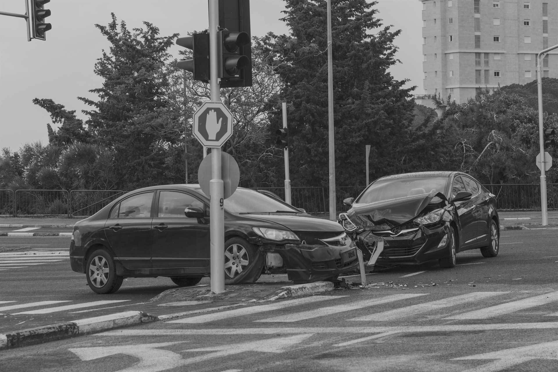 black and white photo of car accident